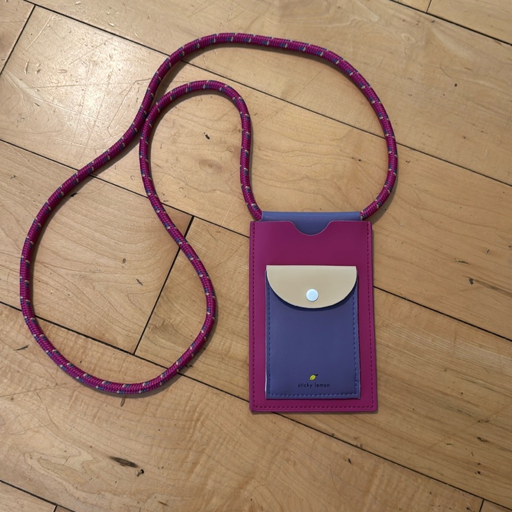 Sticky Lemon iPhone case, expandable pouch and fun rope like strap.  light wt